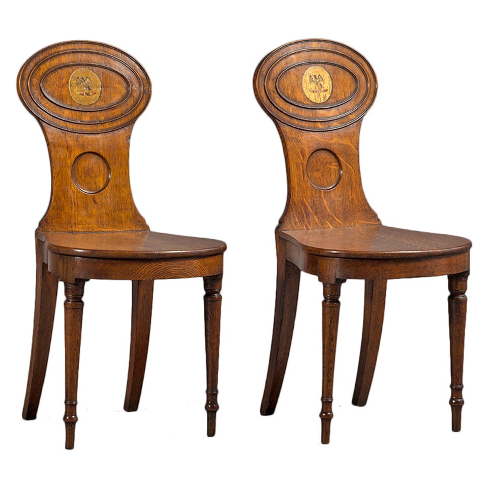 A pair of oak hall chairs circa 1800 For Sale
