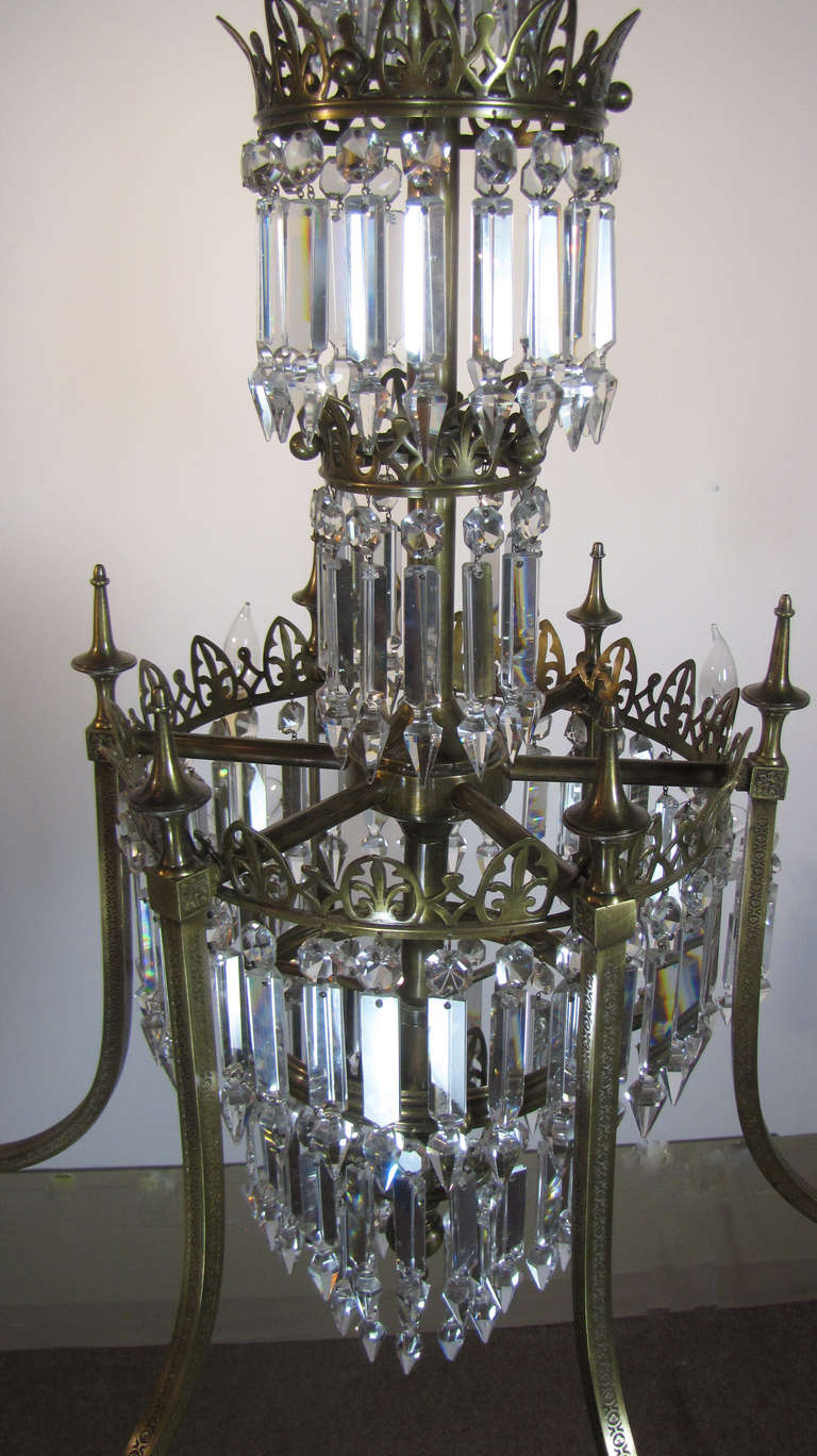 19th Century Pair of Regency Six-Arm Brass and Crystal Chandeliers For Sale