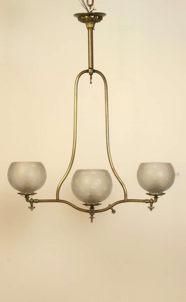 Three light gas chandelier with Star Etched Glass.  Originally gas, and has been wired for use in North America.