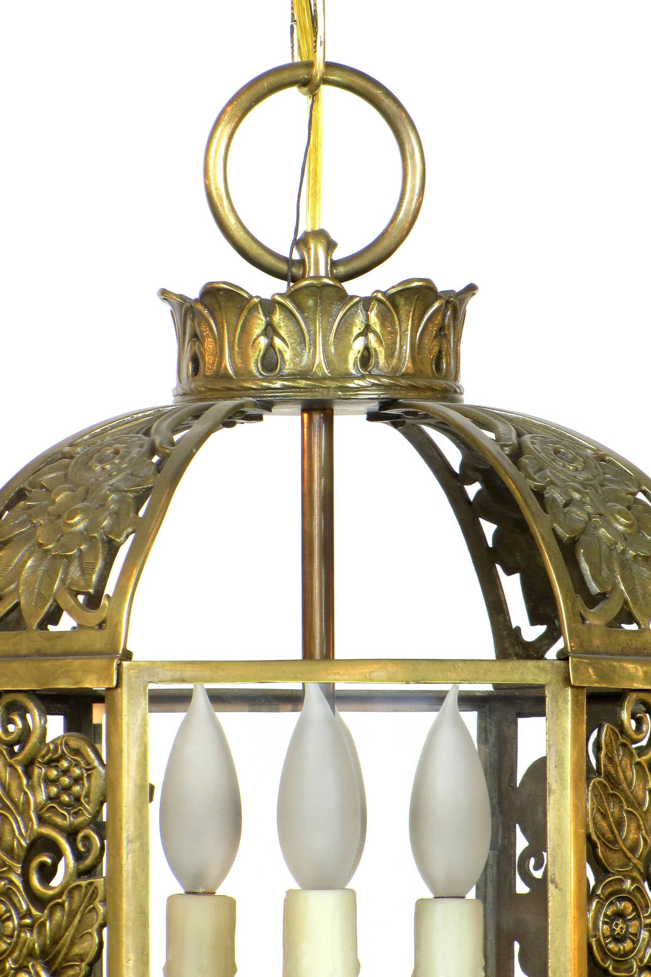Brass and Glass Lantern with Cast Brass Floral designs and Frosted Cut Glass on bottom.  Newly restored and rewired.  UL Listing upon request.  Four light cluster gives quite a lot of light for an entry way.