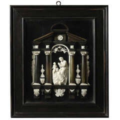 Ivory and Ebonised Relief