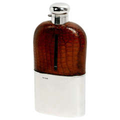 Antique An extremely  large unused 1920s crocodile, silver and glass drinks flask.