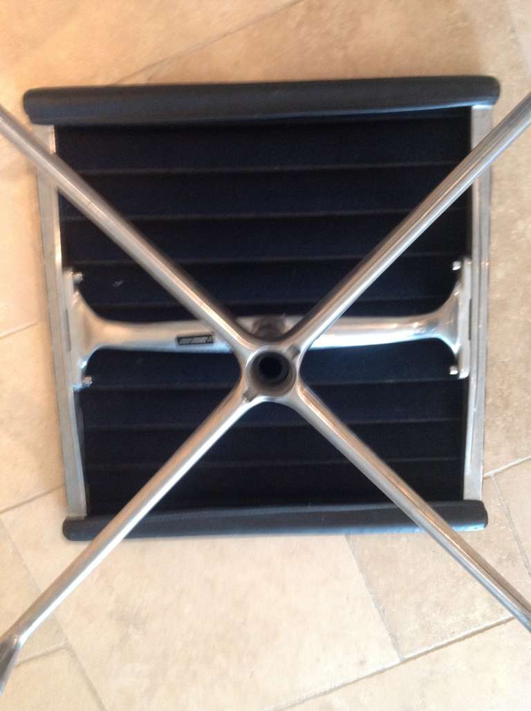 Unknown An Eames Herman Miller aluminium and leather  EA124 lounge chair and ottoman