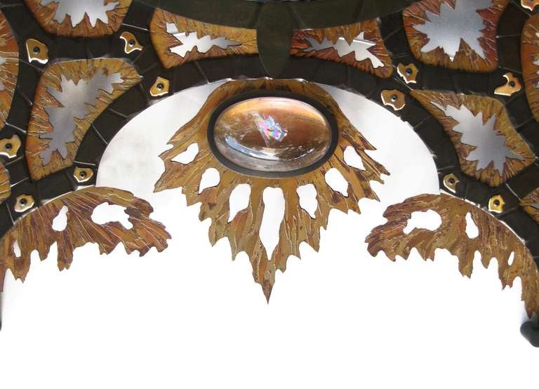 A rare and highly unusual mirror 
Designed by André Dubreuil.

André Dubreuil ( French, 1951 -  ) is a leading figure 
in the contemporary decorative arts world. 
His work is represented in the permanent collections 
of some of the most