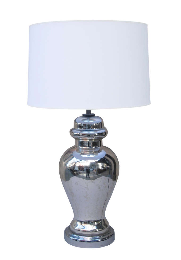 A fine pair of urn-shaped table lamps.