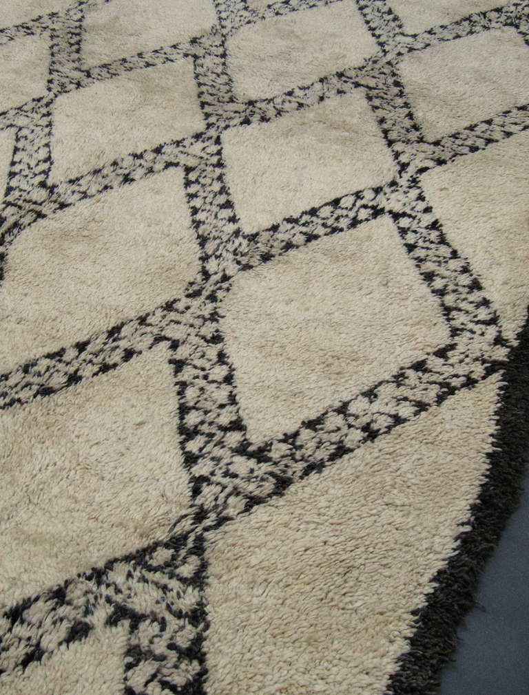 Very large Marmoucha rug with dense thick pile and a pattern of distinct wide band lozenges, characteristic for this type of rug.

(Please note if you are from a country within the EU value added tax will be added to your checkout total).