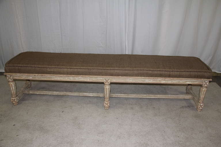 Newly made Louis XVI style bench with hand-painted frame. Seat is upholstered in burlap with thick corner welt detail and pin tufting.