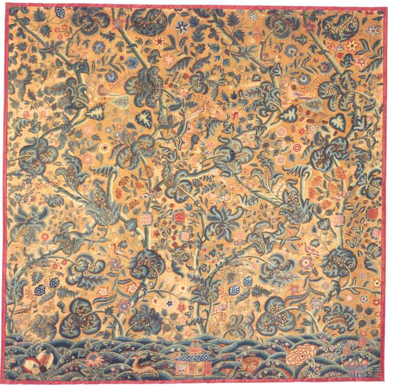An extremely rare pair of late 17th century crewelwork square bed hangings worked on a linen twill background in brightly colored wool and depicting entwined trees with exotic leaves, birds and flowers on a hillock ground with stags, leopards and