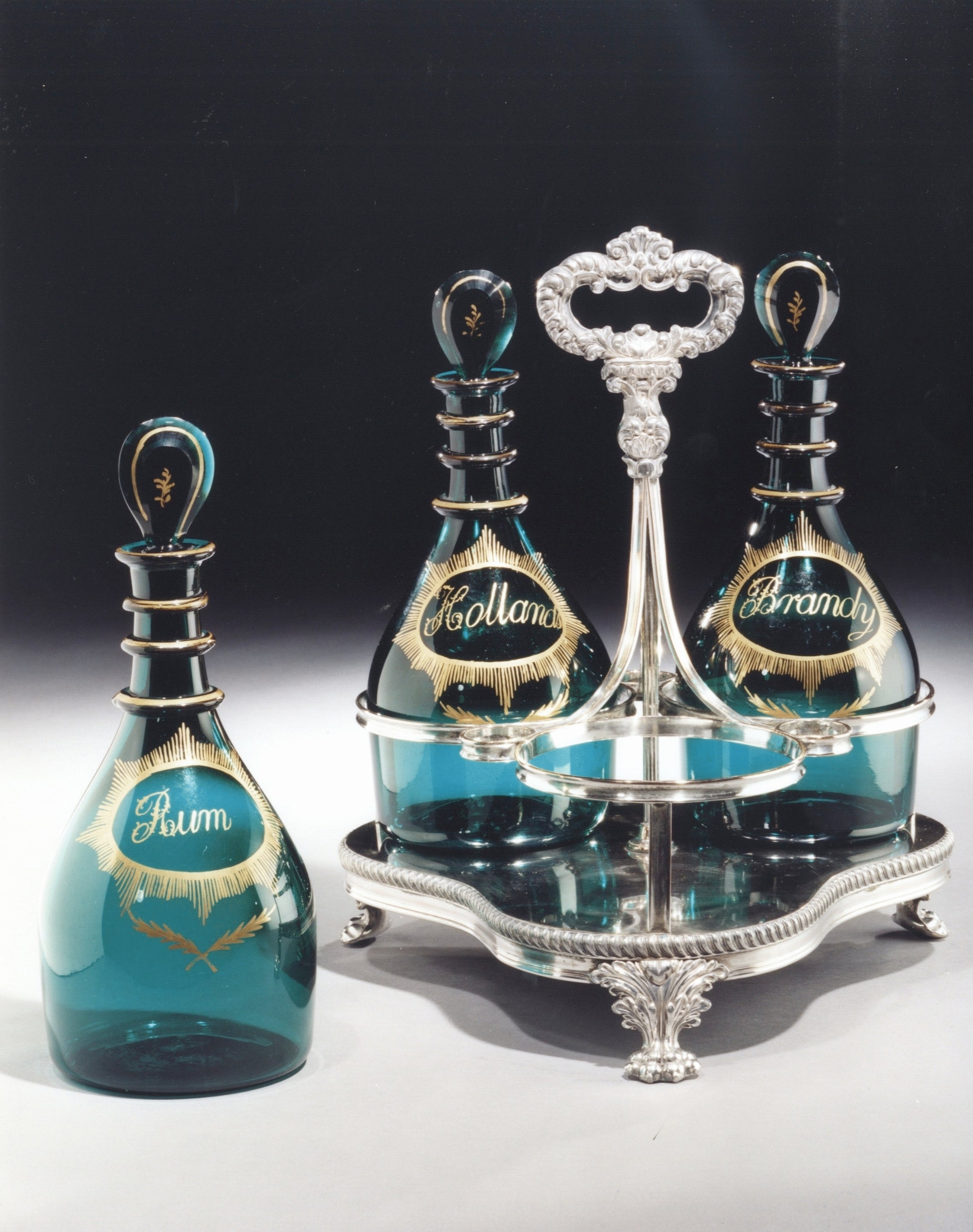 A Set Of Three George III Green Glass Decanters (4427041) For Sale