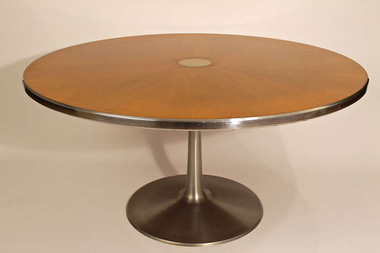 Poul Cadovius 60' Scandinavian Round Dining Table
Very elegant Poul Cadovius Breakfast Table manufactured by CADO  in 1967.  Stunning circular wood table with aluminium pedestal, edging and centre.
140 diameter
We have six Cesca chairs for this