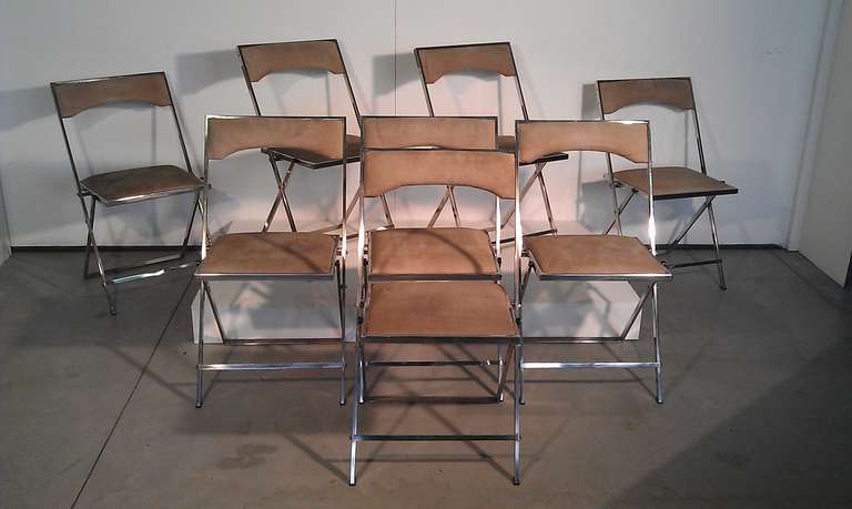 Group of 8 folding chairs signed by Romeo Rega, chrome metal and peccary skin, provenance from beautiful villa in Vicenza as well as its own table