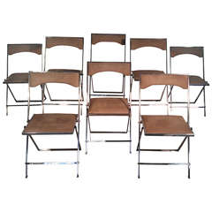 Eight Chairs by Romeo Rega