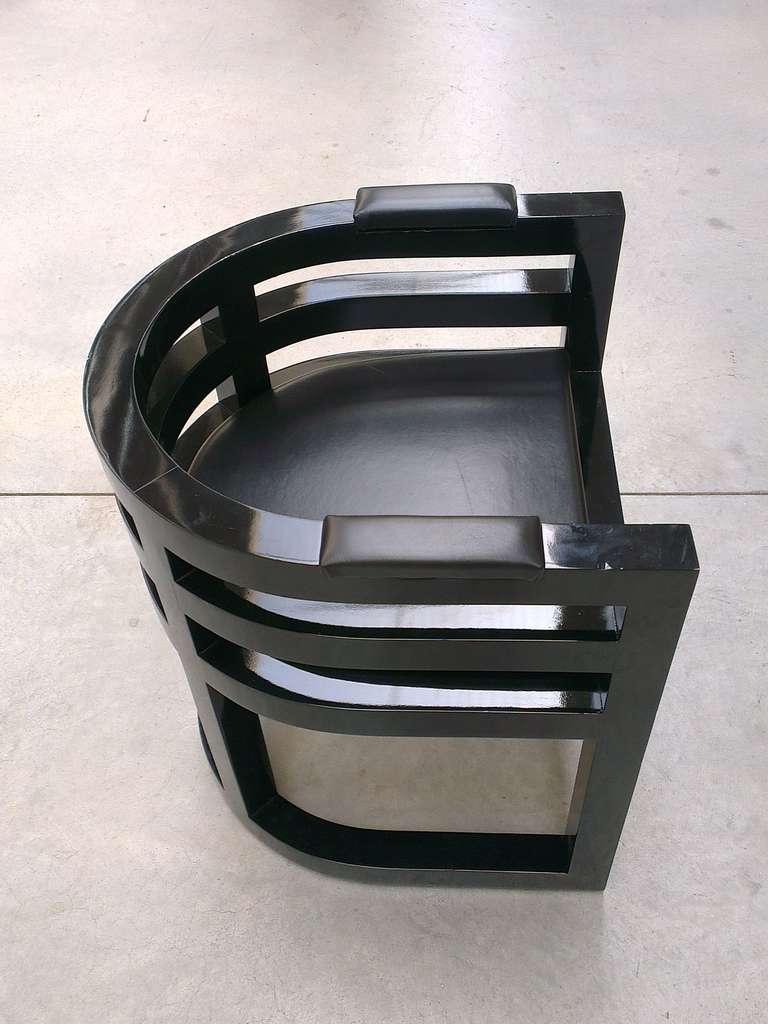 group of five chairs and five stools, wood painted glossy black, seat and armrests upholstered in black leather. 
designed for the stores of Tom Ford in Milano
The chairs are 65 cm height and the stools are 90 cm height