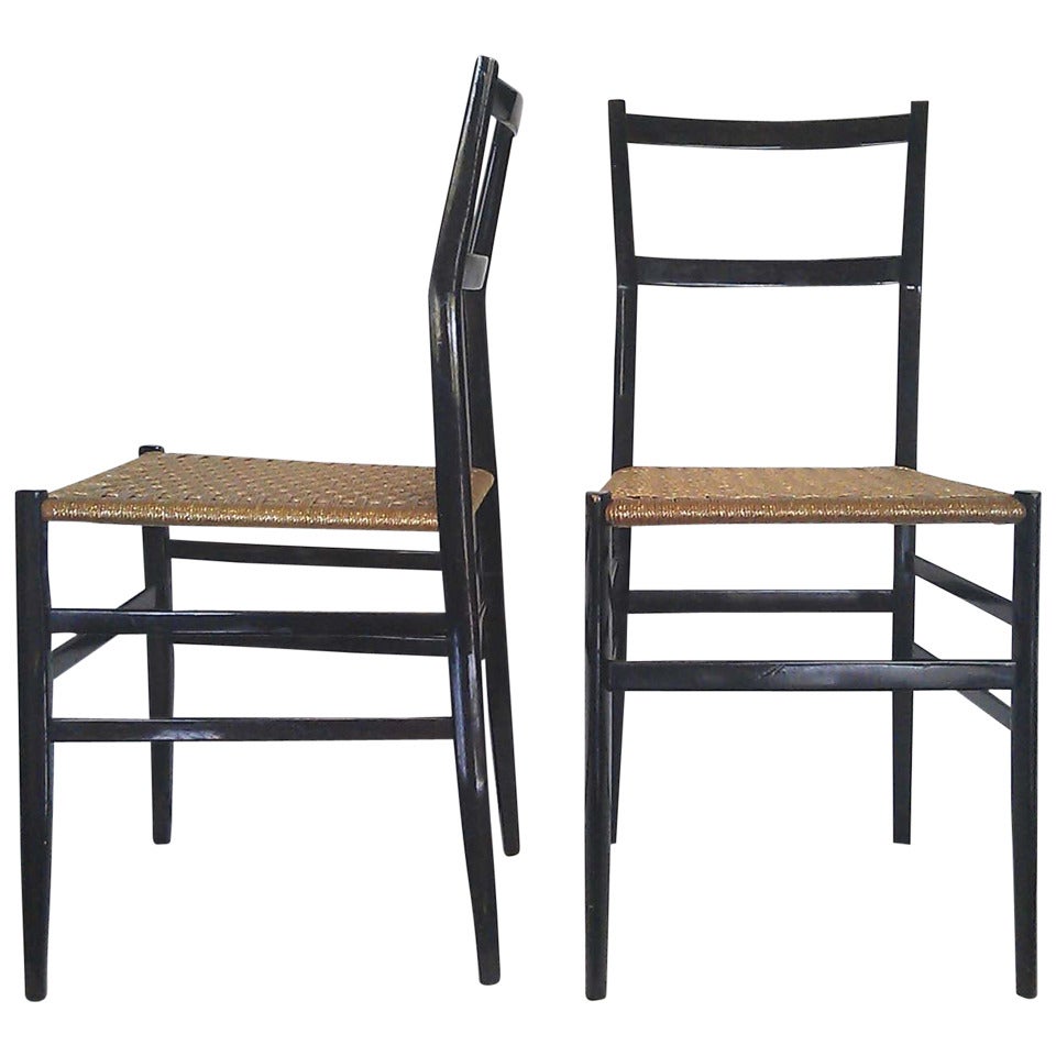 two chairs " superleggera " by  Giò Ponti