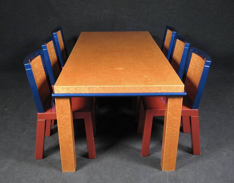 E. Sottsass and M. Zanini, glass cabinet Danube for Leitner, Interieur Design, St. Lambrecht, Austria, 1983.
Limited edition, limited production. Straight-lined design, bird's eye maple veneer surfaces, metallic blue and red paint.

Chairs: W