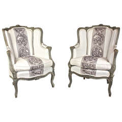 A Pair of Louis XV Style Painted Bergeres