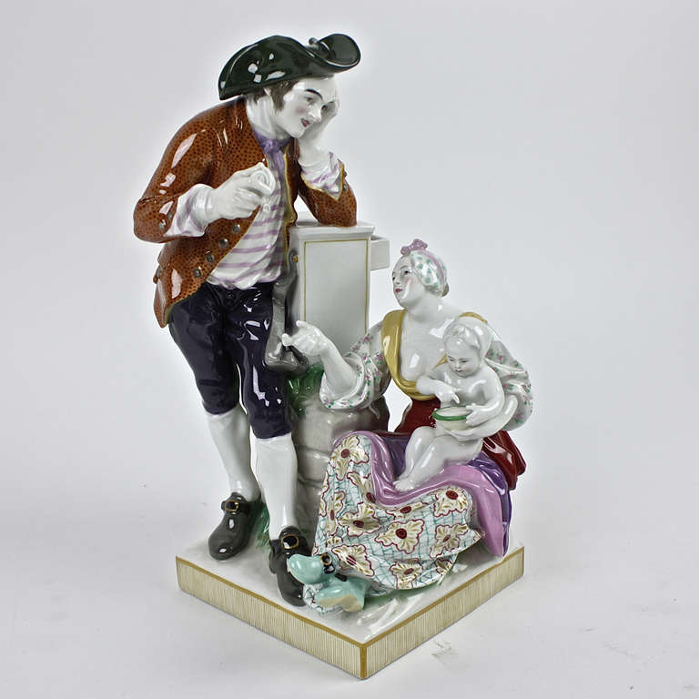 Porcelain figure group of a merchant family. Mother with child in a seated pose. The father resting his arm and head on a dresser looking pensively at mother and child. KPM, Berlin, Scepter and red orb mark. Based on a 18th century design.
