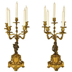Pair of 19th Century Gilt Bronze Candelabra with Winged Cupids
