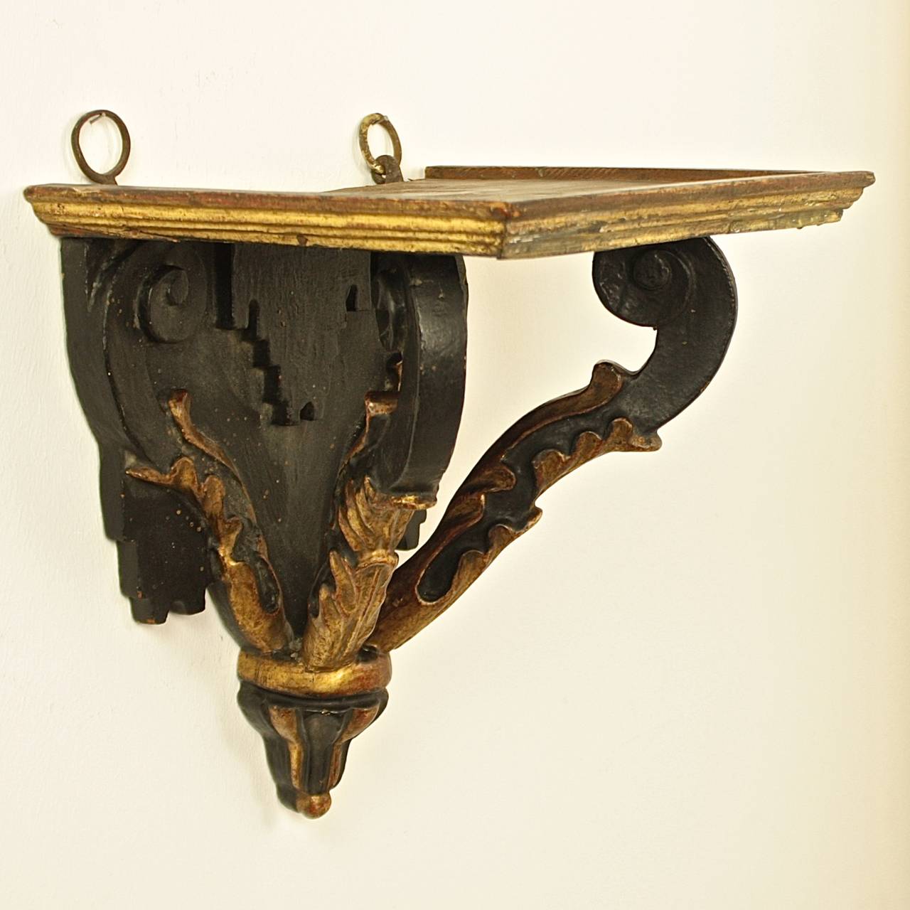Louis XIV 18th Century Regence Giltwood and Black Painted Wall Bracket For Sale