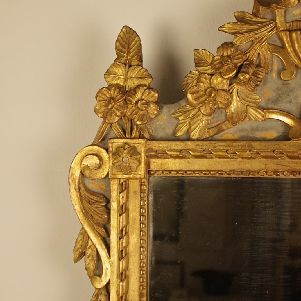 French A Louis XVI Provincial Giltwood and Grey Painted Mirror, late 18th Century