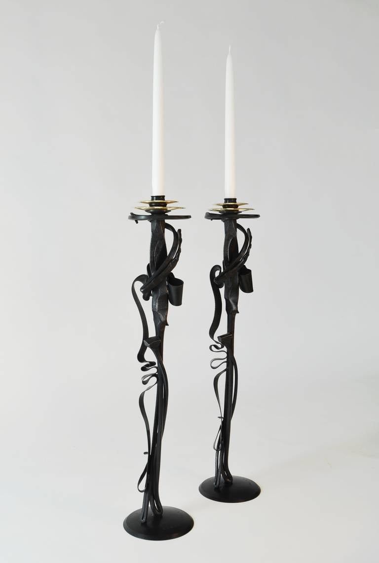 ALBERT PALEY (born 1944)
Scepter Candleholder, 2014
Formed and fabricated blackened steel, brass
24 ¼ x 5 ½ inches 
Signed, dated and numbered at base
Edition of 100

Albert Paley, an active artist for over forty years at his studio in Rochester,