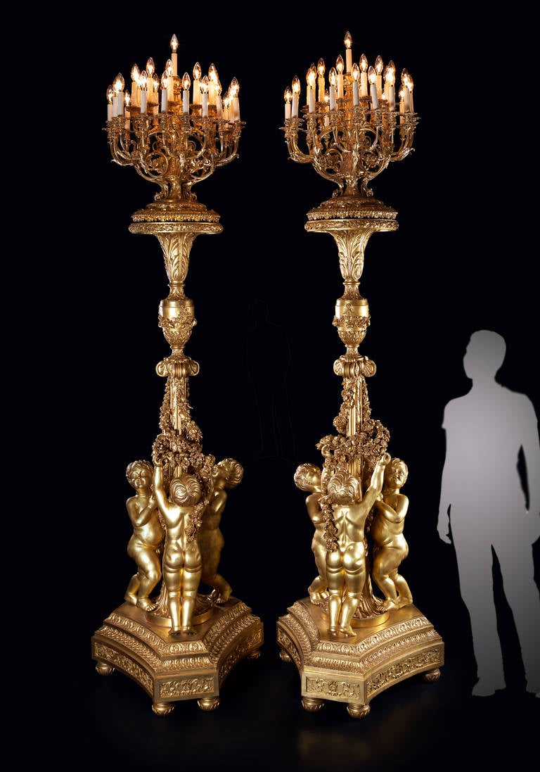 Large Pair of Giltwood Torchères, after Jacques Gondoin For Sale at 1stdibs