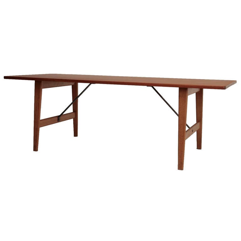 A console table with top in teak on an oak base with brass hardware. Designed by Børge Mogensen in 1955. Made by cabinetmaker Erhard Rasmussen, Denmark