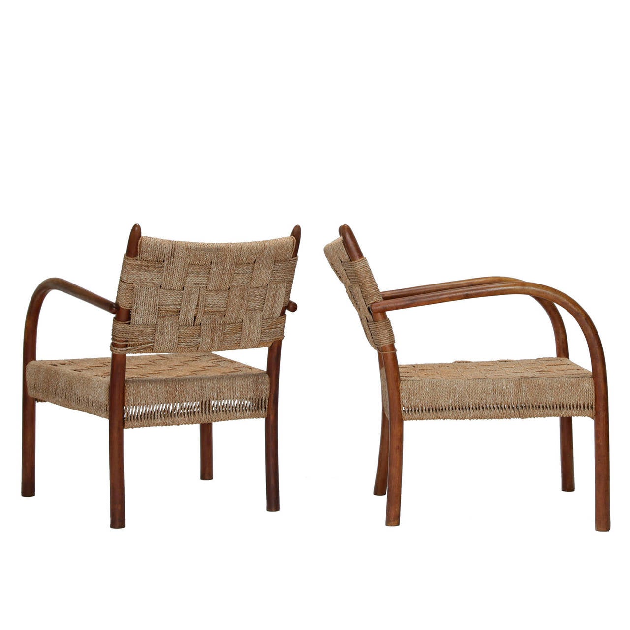 A pair of armchairs in beech with seagrass cord. Designed by Fritz Schlegel, circa 1930. Made by Fritz Hansen, Denmark.