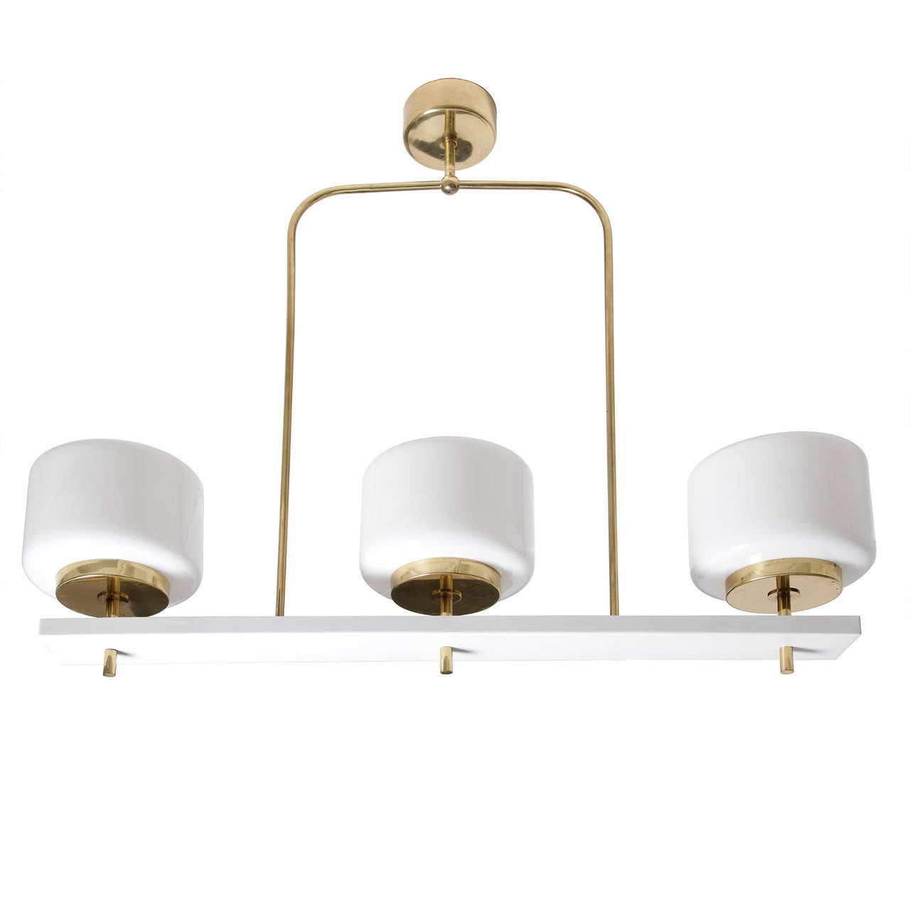 A three-shade chandelier in brass and painted metal with opal glass shades. Designed by Paavo Tynell for the Church Community Centre, Joensuu. Made by Idman, Finland. Two pieces available.
