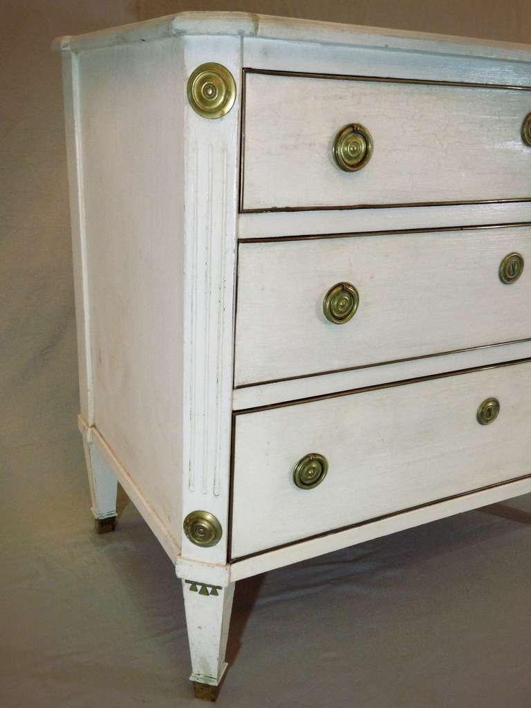 A Swedish Gustavian Style White Painted Chest of Drawers 1