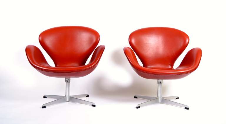 Pair of Arne Jacobsen Swan Lounge Chairs

Early versions from 1965 with moulded aluminium swivel base.

The Swans have always been a pair and they are a perfect match.

The upholstery has been redone with premium Indian Red Elegance untreated