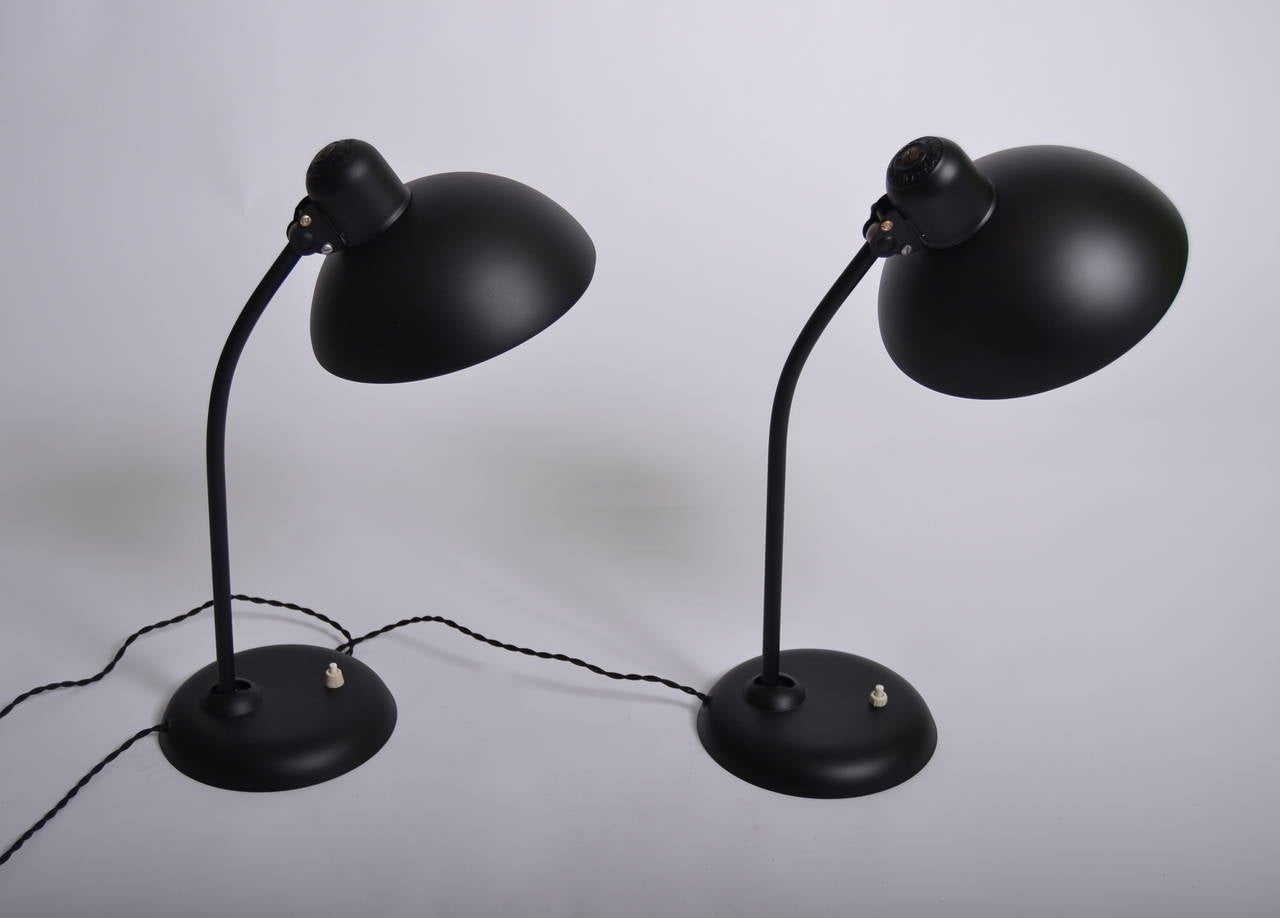 Christian Dell Pair of Bauhaus Desk Lamps

Model 6556

Perfectly restored and rewired

the colour is matte black

Diameter of shade 21 cm
