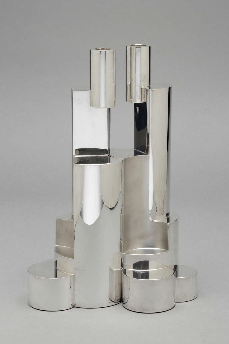 A sterling silver Candelabra of unique design, Spanish, 2008.  Juan & Paloma Garrido.  Model Cilindros.  Limited edition 2/8.  From our recently acquired Garrido collection.

Ht 17.5 inches