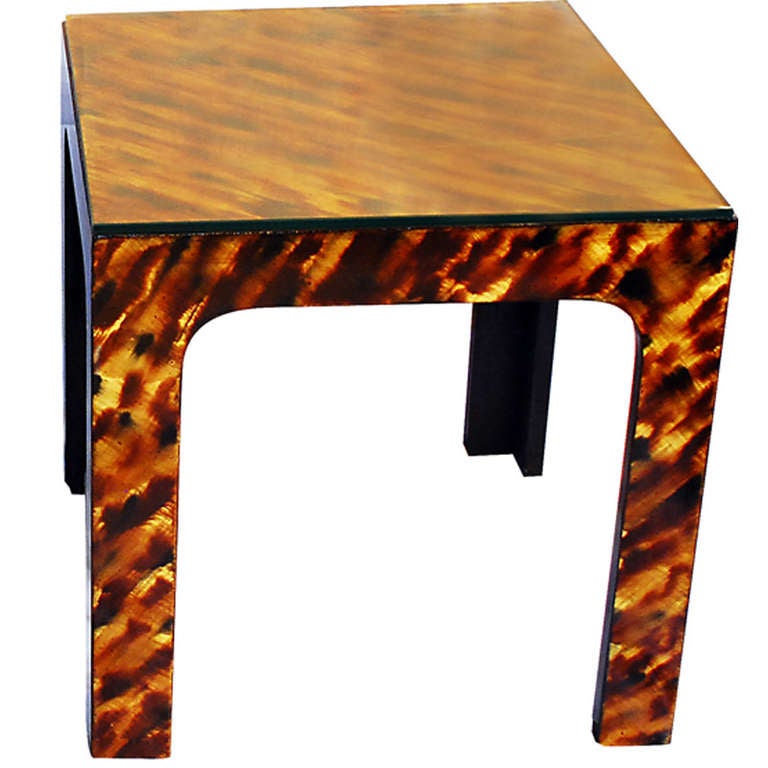 This pair features clean modern lines, beautifully hand-painted in a leopard-style tortoise finish, complete with custom glass tops.
