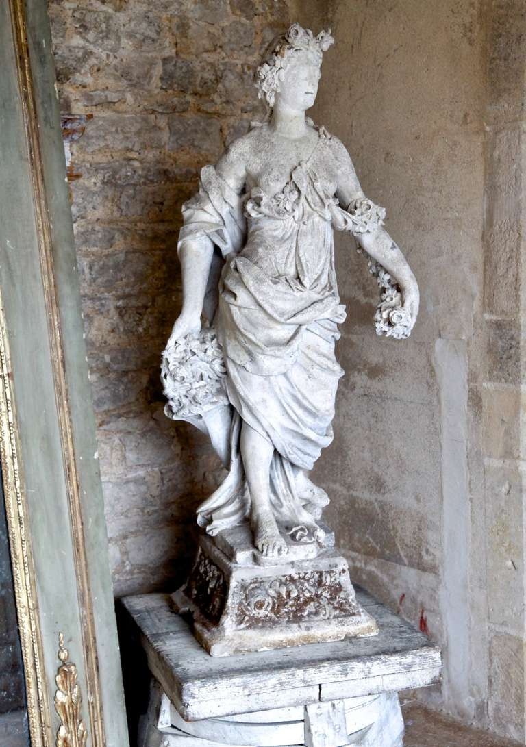 Carved limestone figure of Flora