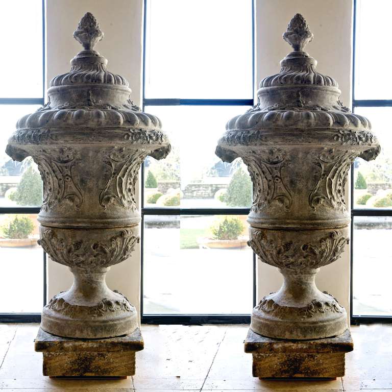 A very rare and impressive pair of Louis XIV cast iron urns