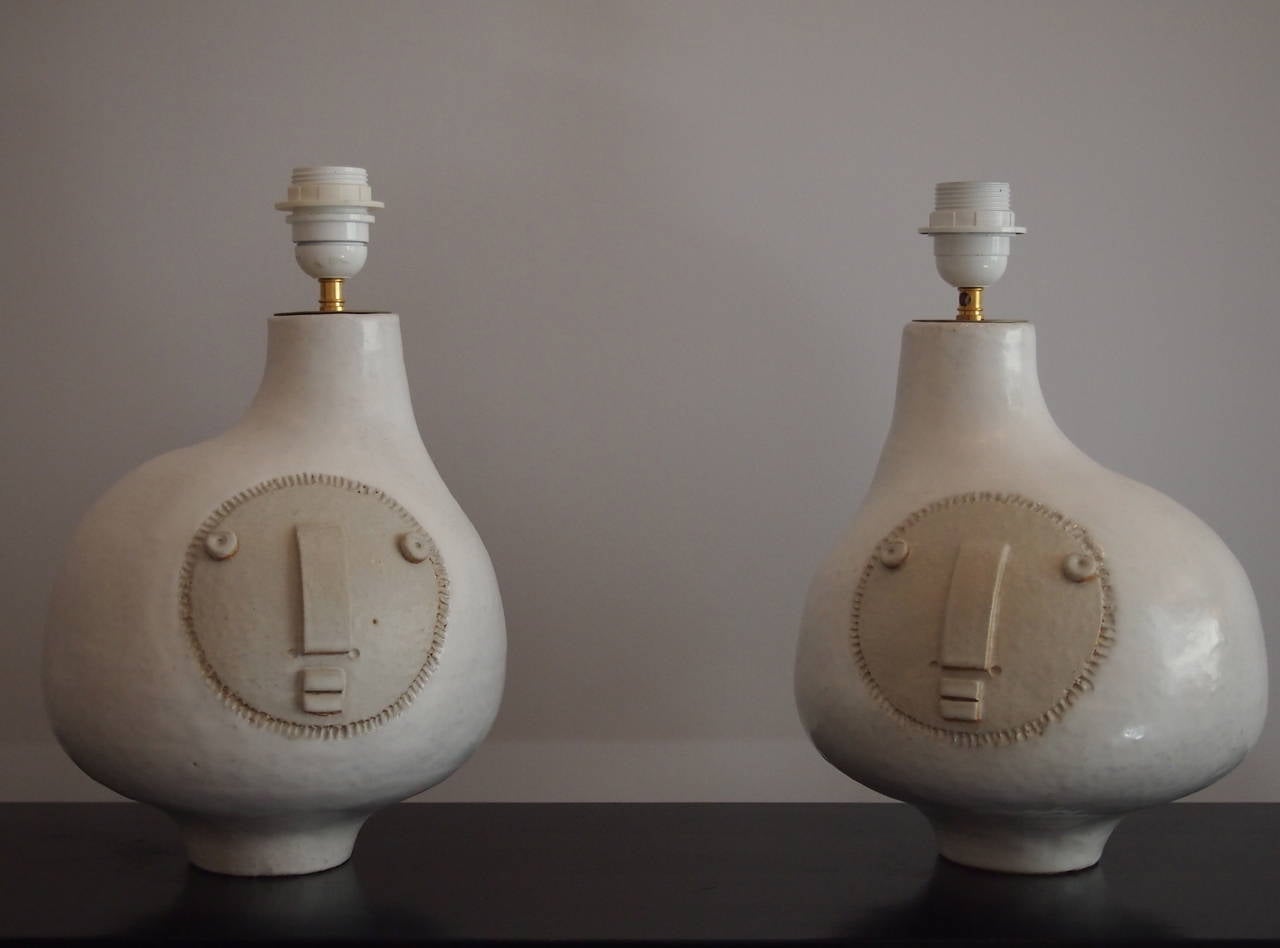 Pair of ceramic lamps with faces from  Dalo.

Dalo are two french contemporain ceramists artists.

Each piece is a 4 hands work.

Each piece is unique.