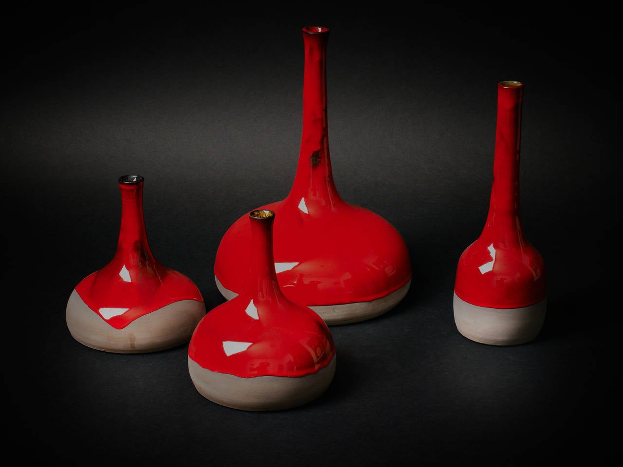 French  Set of Four Red Enameled Stoneware Bottles by Dalo For Sale