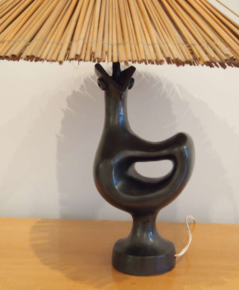 Georges Jouve (1910-1964). Black ceramic bird lamp. Original shade. Height 27: cm. Signed Jouve + Alpha. 

Bibliography : Jousse Enterprise p. 234.