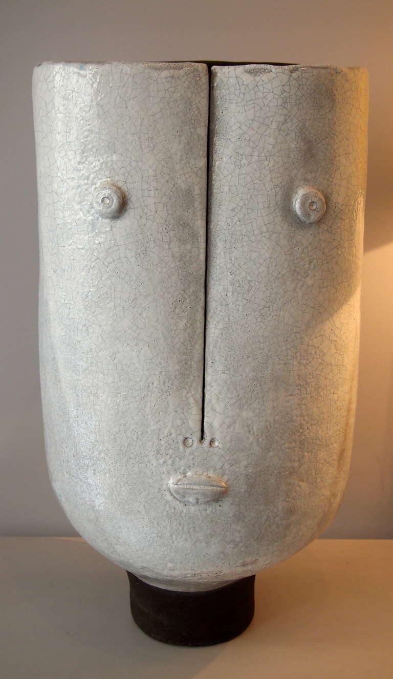Large sculpture vase 'Idole' in brown sandstone with partial white crackled enamel.

2013 creation of the Parisian ceramic artists DALO.

Daniel & Loic (DALO) are designing together since 2007 original ceramic pieces. Inspired by the second part