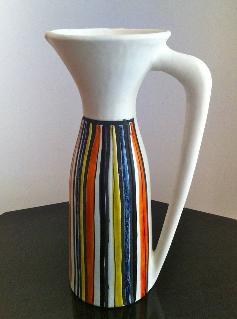 Roger Capron (1922-2006).

Colored enameled ceramic Pitcher ; 1955-1957.
Signed Capron Vallauris