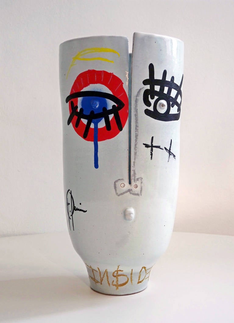 Grégore Devin design on a white enameled ceramic vase by Dalo.

Daniel & Loic (Dalo) are designing together since 2007 original ceramic pieces. Inspired by the second part of the 20th century French ceramists, they created their own style, a