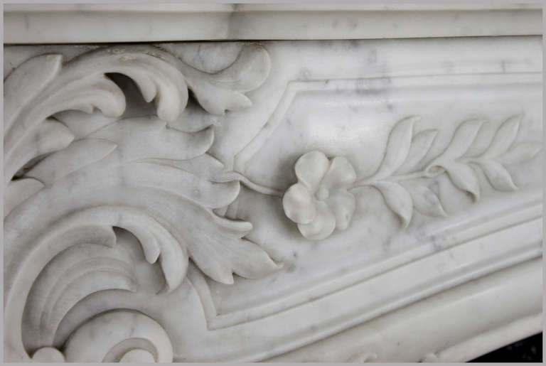 Italian Antique Floral Louis XV Style Fireplace In White Carrara Marble from the 19th Century