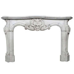 Antique Louis XV fireplace in Statuary Carrara marble, early 19th century