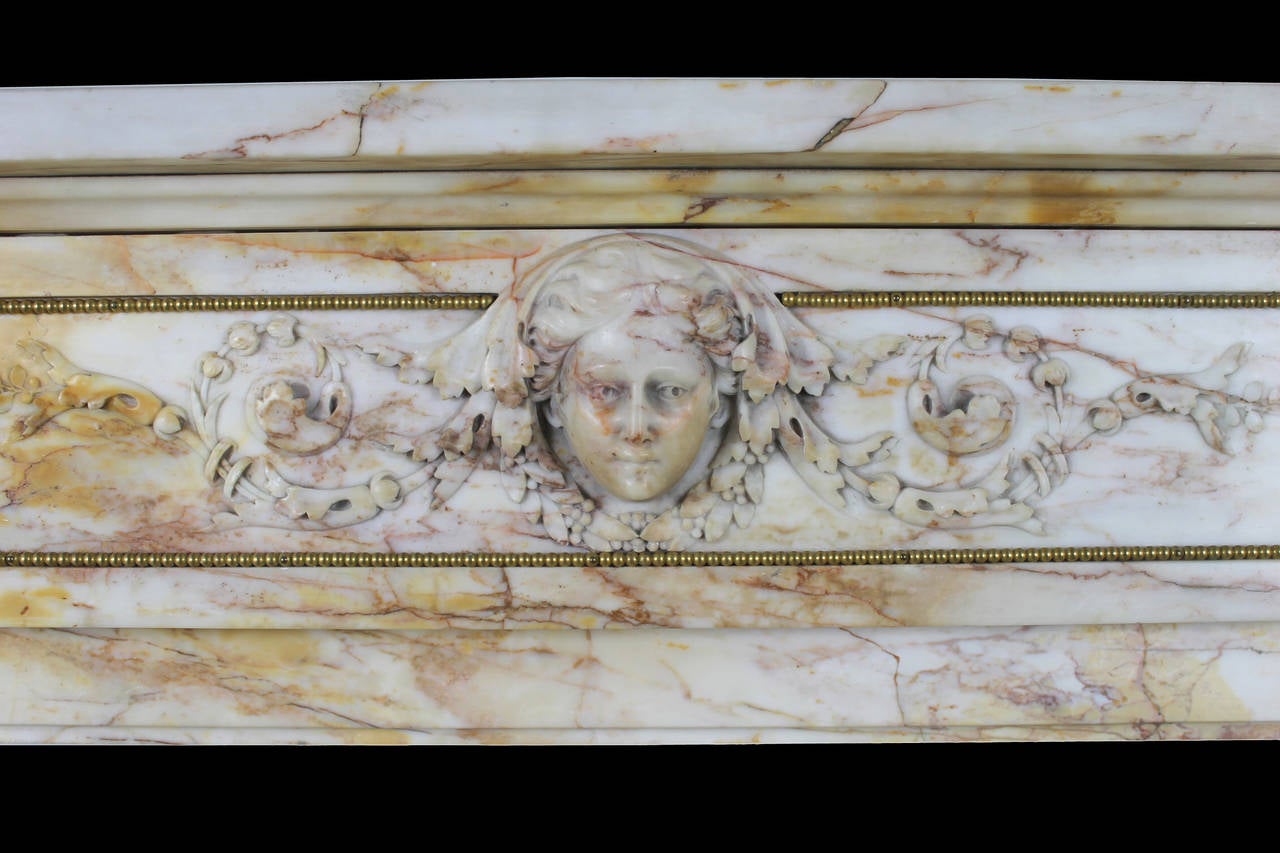 Antique Louis XVI fireplace chimneypiece in Yellow Siena marble, 19th century