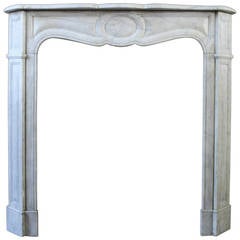 Antique Louis XV "Pompadour Bombé" fireplace in white Carrara, 19th century Antique Louis XV "Pompadour Bombé" fireplace in white Carrara, 19th century