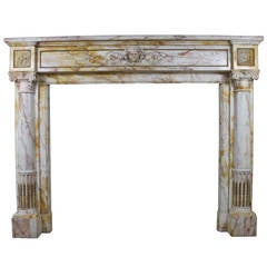 Antique Louis XVI fireplace chimneypiece in Yellow Siena marble, 19th century