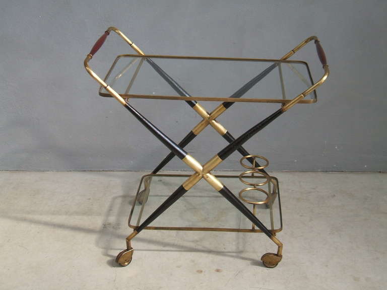 Cesare Lacca bar trolley,bottle holder
Rosewood and brass. Italy 1940