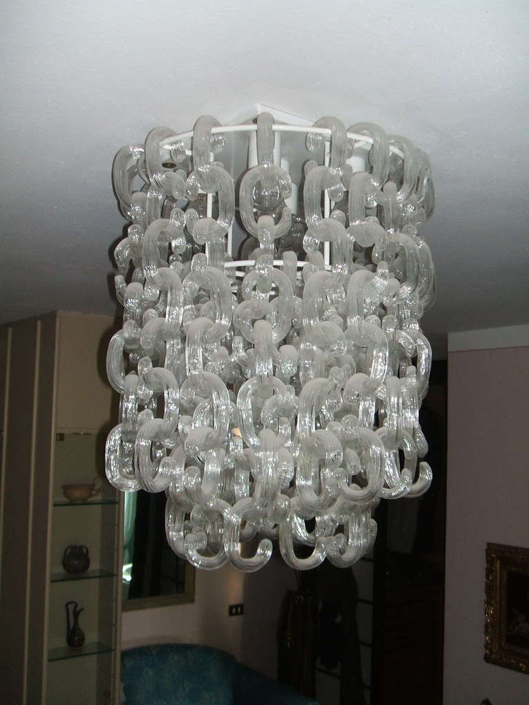 1970's Murano glass chandelier designed for the family by Toso,
Installed in the 70's and it remained in the same house for the last 40 plus years. Each piece is hand blown clear glass,