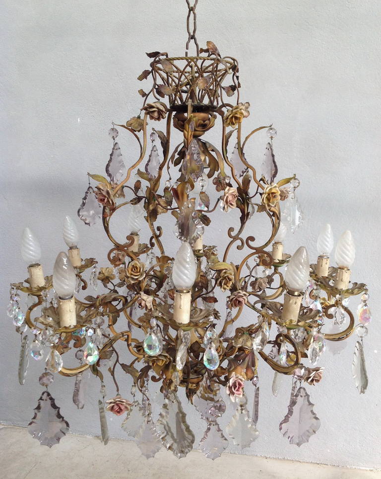 Eleven-lights chandelier with many porcelain flowers and nice basket on the top
To be rewire for usa
